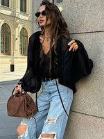 Blusa oversize nera con dettaglio di cravatta scollo a V manica raglan lunga a lanterna top casual trasparenti per le donne 2025