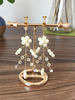 Gioielli per le perle da sposa in oro