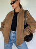 Giubbotto bomber in pelle scamosciata marrone con collo alto e cerniera oversize capospalla primaverile per donna 2025