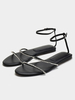 Sandali gladiatore neri piatti con punta tonda e strass da donna in pelle sintetica