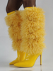 Stivali gialli alti fino al ginocchio con pelliccia sintetica e punta a punta e tacco alto